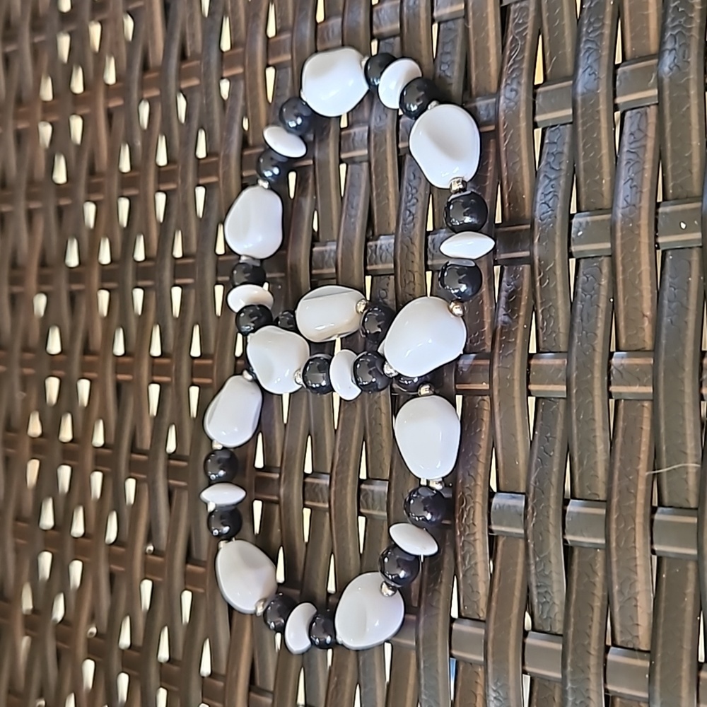 Pair of Black and White Beaded Stretch Bracelets